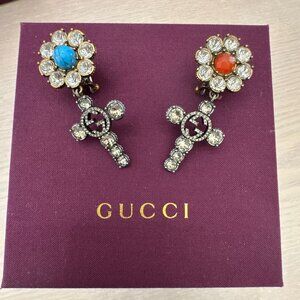 Gucci Interlocking G cross drop clip-on earrings